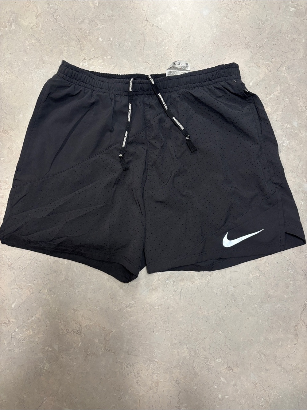 Nike Black Athletic Running Shorts with White Swoosh